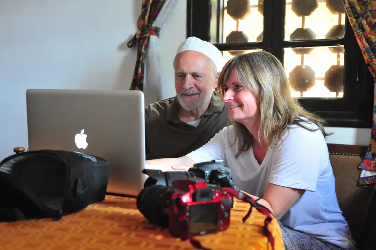 Peter Sanders reviewing work with a participant in Morocco